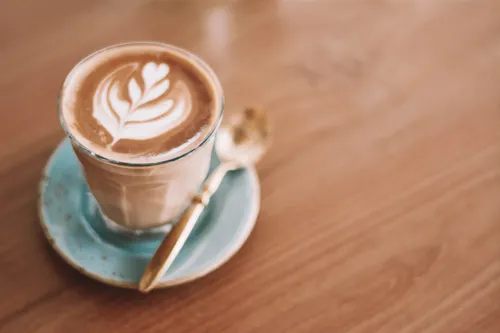 Latte art in a glass cup